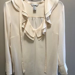 Cream ruffle blouse